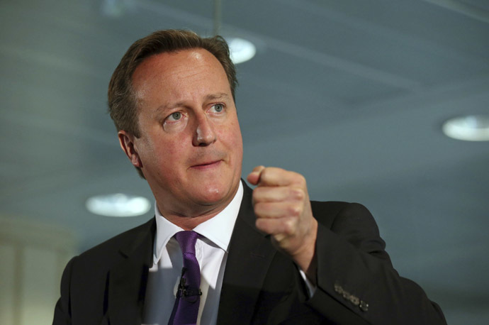 Britain's Prime Minister David Cameron gestures as he speaks during a visit to the Scottish Widows building in Edinburgh, Scotland September 10, 2014. (Reuters/Andrew Milligan)