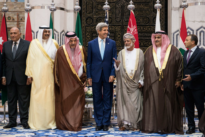 (L-R): Egyptian Foreign Minister Sameh Shoukry, Kuwaiti Foreign Minister Sabah Al-Khalid al-Sabah, Saudi Foreign Minister Prince Saud al-Faisal, US Secretary of State John Kerry, Omani Foreign Minister Yussef bin Alawi bin Abdullah, Bahraini Foreign Minister Sheikh Khaled bin Ahmed al-Khalifa and Lebanese Foreign Minister Gebran Bassil, stand together during a family photo with of the Gulf Cooperation Council and regional partners at King Abdulaziz International Airportâs Royal Terminal on September 11, 2014 in Jeddah, Saudi Arabia. (AFP Photo / Pool / Brendan Smialowski) 