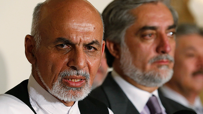Afghan presidential candidates sign power-sharing deal