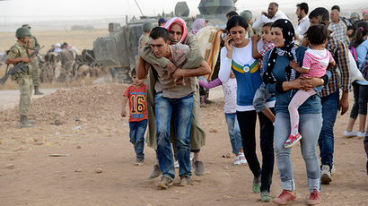 New clashes erupt at Syrian-Turkish border as 130k refugees flee