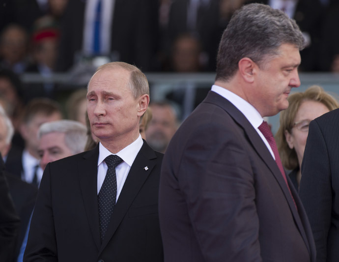 June 6, 2014. President Vladimir Putin (left) and Ukrainian President-Elect Petro Poroshenko (RIA Novosti/Sergey Guneev)