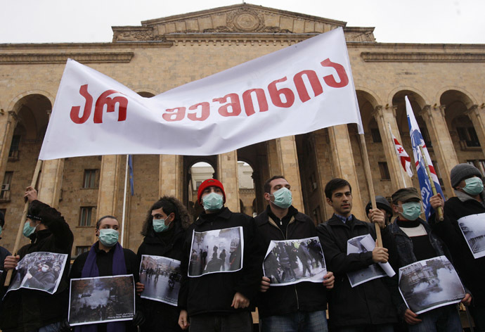 Members of youth opposition organisations protest in front of the parliament building in Tbilisi November 20, 2007. (Reuters/David Mdzinarishvili)