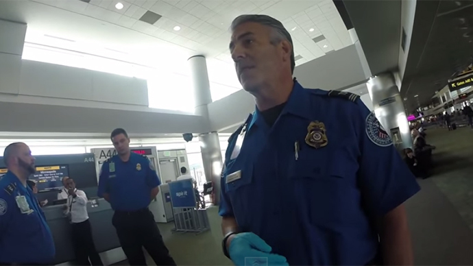 TSA officers try to screen passenger after his flight, threaten him after refusal (VIDEO)