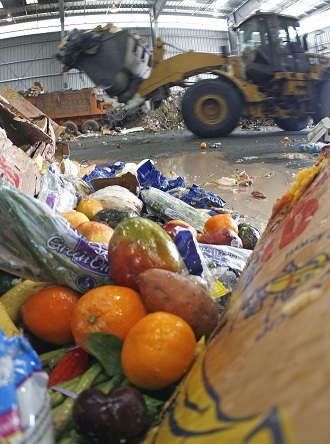 Expired fruits from a supermarket sit on the sorting floor at a recycling center (Reuters/Tim Shaffer)