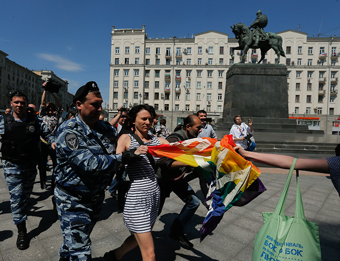 Gay rights activists are detained by police during a protest in Moscow (Reuters / Maxim Shemetov)
