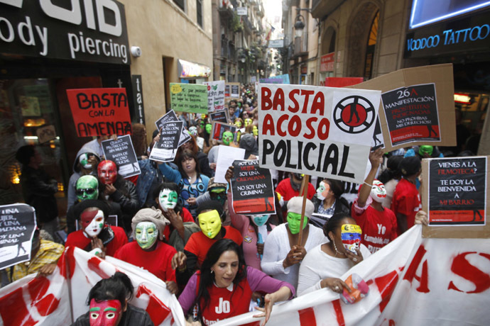 Members of the platform of "Indignant Prostitutes" and their supporters staged a demonstration in central Barcelona to protest against the city's plans to modify a law that seeks to prohibit street prostitution in the Catalan capital, April 26, 2012. (Reuters/Gustau Nacarino)