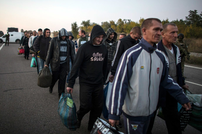 Rebel captives wait to be exchanged, north of Donetsk, eastern Ukraine, September 28, 2014.(Reuters / Marko Djurica)