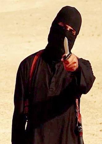 An image grab taken from a video released by the Islamic State (IS) and identified by private terrorism monitor SITE Intelligence Group on September 2, 2014 purportedly shows a masked militant holding a knife and gesturing as he speaks to the camera in a desert landscape (AFP Photo / SITE)