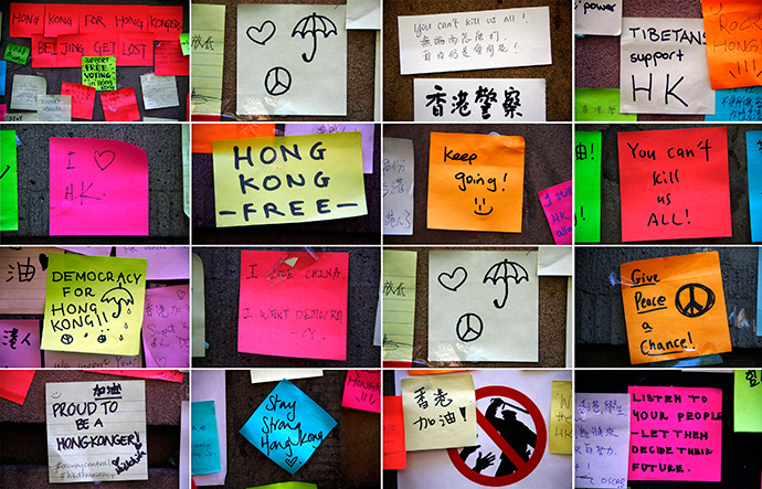 A combination photo shows messages of support for pro-democracy protesters in Hong Kong written on bits of paper stuck to the outside of Hong Kong House in central Sydney October 5, 2014 (Reuters / David Gray)