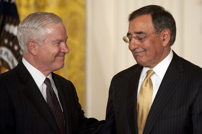 US Secretary of Defense Robert Gates (L) congratulates CIA Director Leon Panetta (R). (AFP Photo/Jim Watson)
