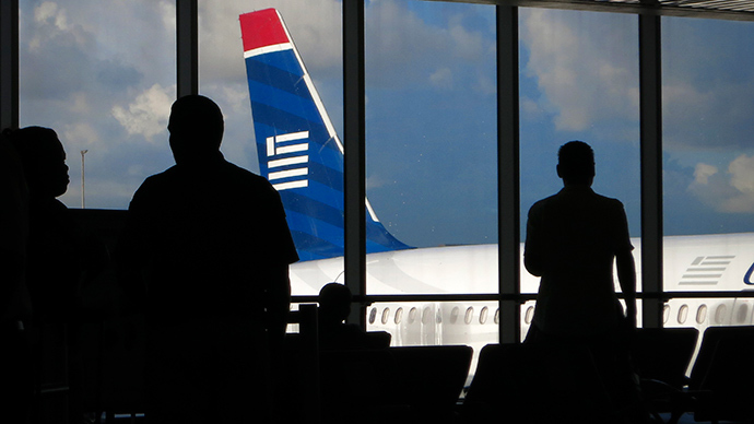 ‘You’re all screwed!’ Man jokes he has Ebola, taken off plane by hazmat-suited medics