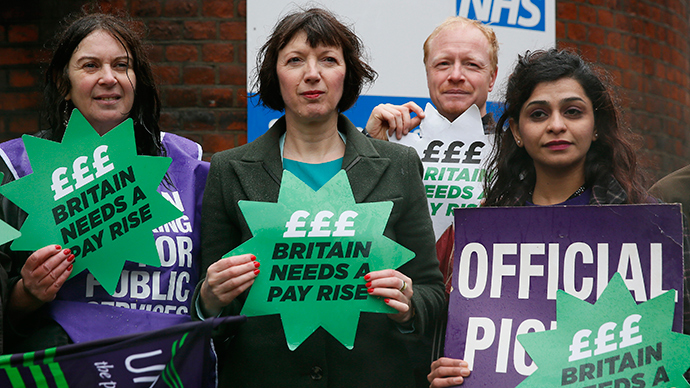 Tens of thousands of NHS workers stage historic pay strike