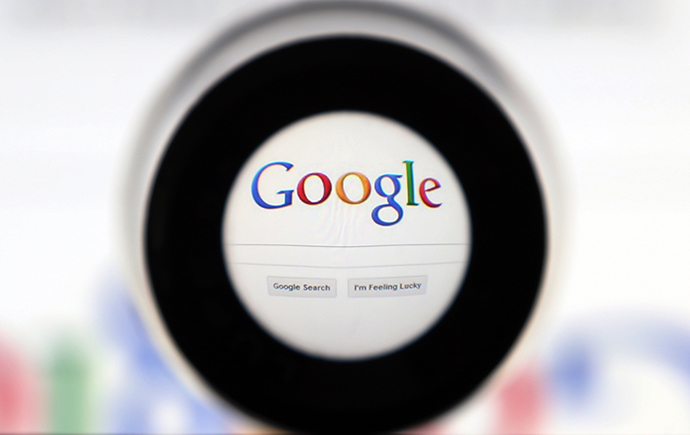 A Google search page is seen through a magnifying glass (Reuters / Francois Lenoir)
