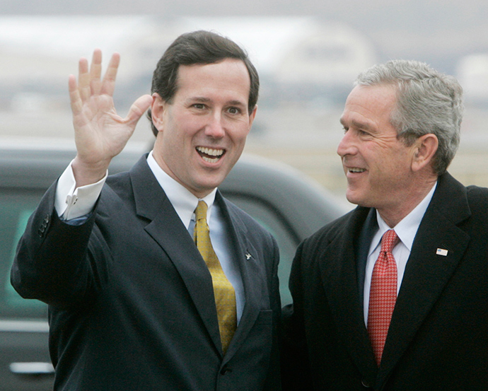ARCHIVE PHOTO: U.S. President George W. Bush (R) is met by U.S. Senator Rick Santorum (R-Pa) after Bush arrived on Air Force One in Pittsburgh, March 24, 2006 (Reuters / Larry Downing)