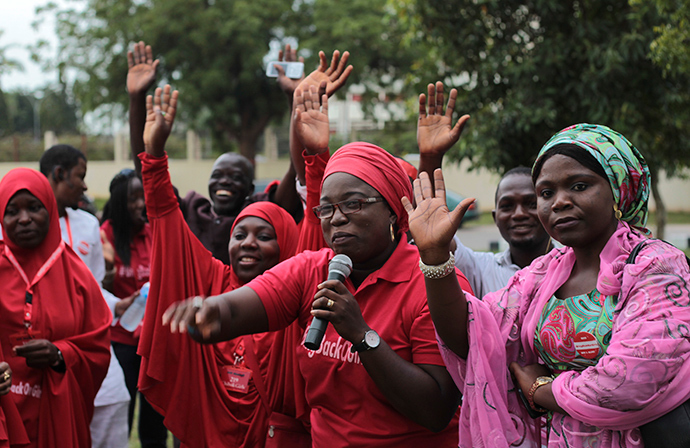 Campaigners from "#Bring Back Our Girls" gesture during a rally calling for the release of the Abuja school girls who were abducted by Boko Haram militants, in Abuja October 17, 2014 (Reuters / Afolabi Sotunde)
