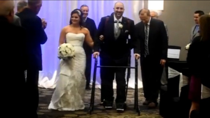 Paraplegic groom walks down aisle thanks to robotic exoskeleton (VIDEO)