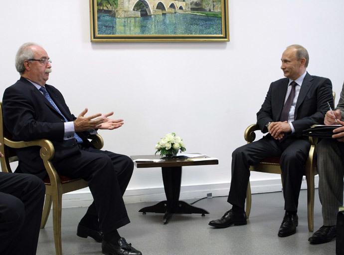 Total CEO Christophe de Margerie with Russian President Vladimir Putin in Paris on June 11, 2010. (AFP Photo / RIA Novosti / Pool / Alexei Nikolsky)