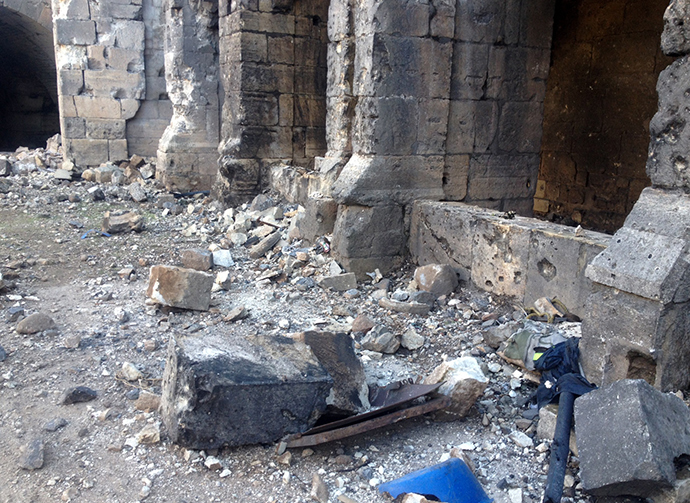 A picture taken on March 20, 2014 shows damage in the renowned Crusader castle Krak des Chevaliers (AFP Photo / Sam Skaine)