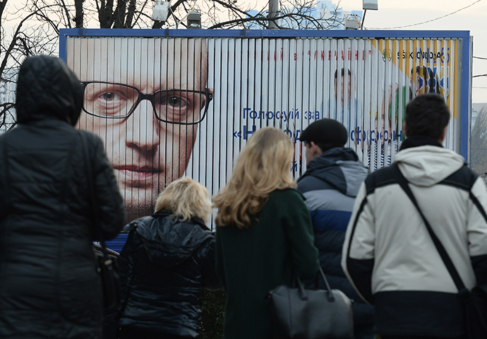 Campaign poster with the Ukraine's Prime Minister Arseny Yatsenyuk in Kiev (RIA Novosti / Maksim Blinov)