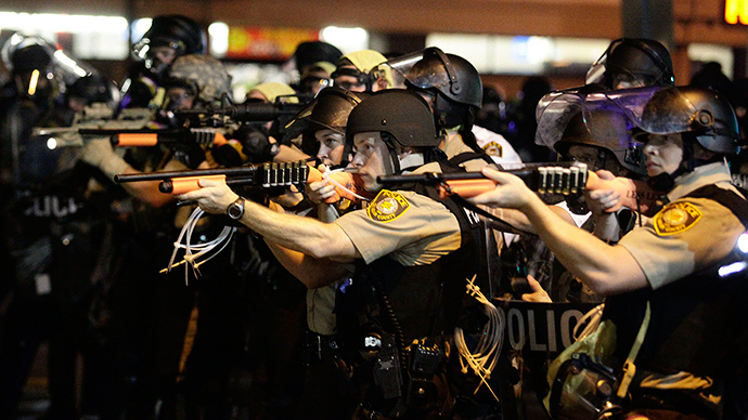 'Fighting effects of tear gas': Amnesty says Ferguson cops violate basic human rights