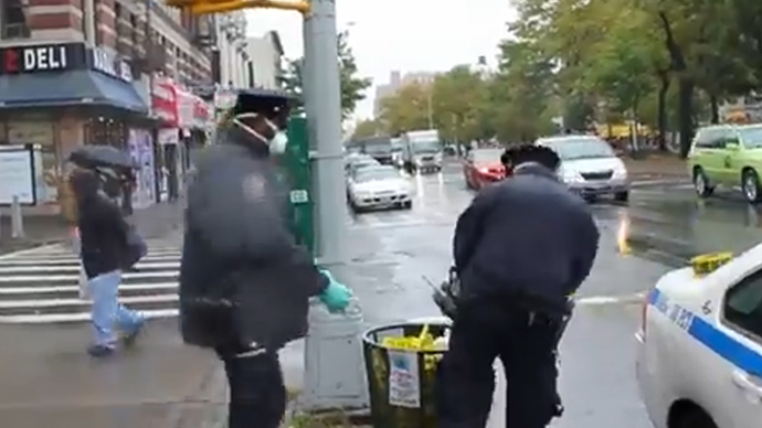 NYPD caught dumping gloves, masks from Ebola site into street garbage can (VIDEO)