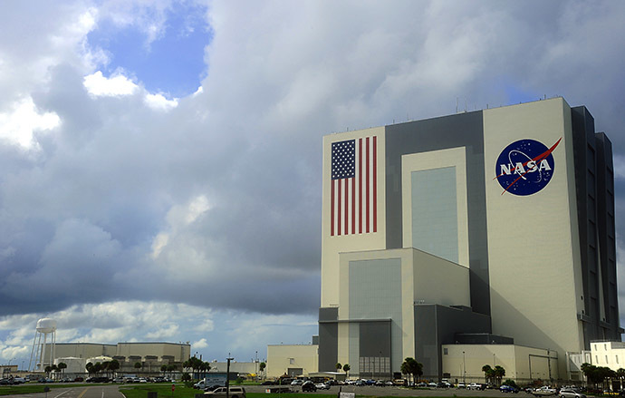 Heavy clouds begin to move over the Vehicle Assembly Building. (AFP Photo/Karen Bleier)