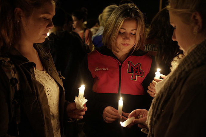 Students and community members attend a vigil at the Grove Church after a shooting at Marysville-Pilchuck High School in Marysville. (Reuters/Jason Redmond)