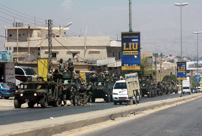 Lebanese army troops are seen stationed near the Lebanese-Syrian border in al-Masnaa (AFP Photo / Str