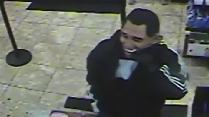 Obama impostor robs Dunkin' Donuts with mask & gun (VIDEO)