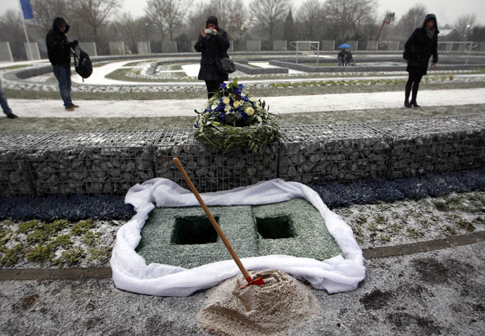 wo graves are pictured at a specially designed cemetery for Schalke 04 fans during its opening ceremony near the football stadium in Gelsenkirchen December 7, 2012. (Reuters/Ina Fassbender)