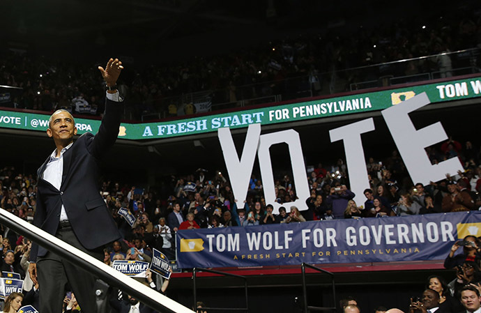 U.S. President Barack Obama waves before he speaks at a campaign event for Tom Wolf, who is running for Governor of Pennsylvania, while in the Liacouras Center at Temple University in Philadelphia, November 2, 2014. (Reuters/Larry Downing)