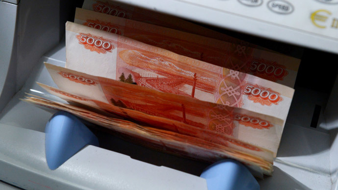 Russian ruble plunges as Central Bank announces limit to intervention