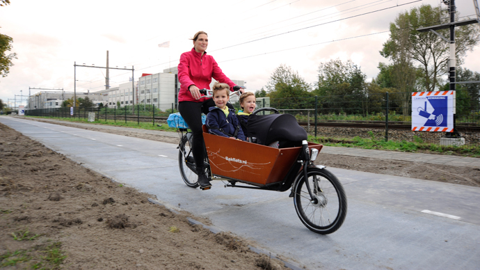 Cycling on sunshine: World’s first solar bike lane opens in Netherlands