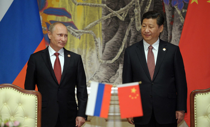 China's President Xi Jinping (R) and Russia's President Vladimir Putin attend an agreement signing ceremony in Shanghai on May 21, 2014.(AFP Photo / Alexey Druzhinin)