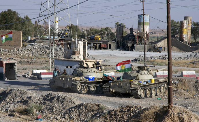 Members of the Kurdish security forces take part during an intensive security deployment after clashes with militants of the Islamic State, formerly known as the Islamic State in Iraq and the Levant (ISIL), in Jalawla, Diyala province August 12, 2014. (Reuters)