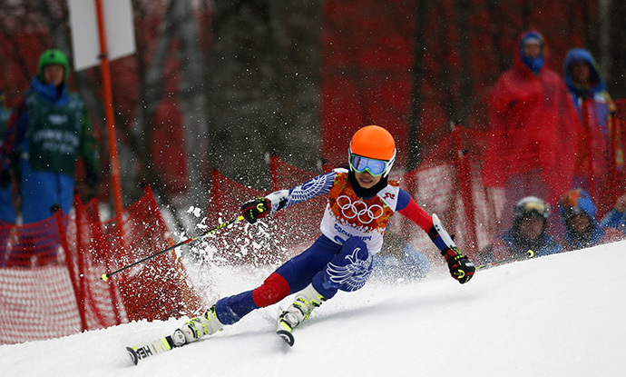 Vanessa Mae, competing for Thailand under her father's name Vanessa Vanakorn, skis during the first run of the women's alpine skiing giant slalom event at the 2014 Sochi Winter Olympics at the Rosa Khutor Alpine Center February 18, 2014. (Reuters/Stefano Rellandini)