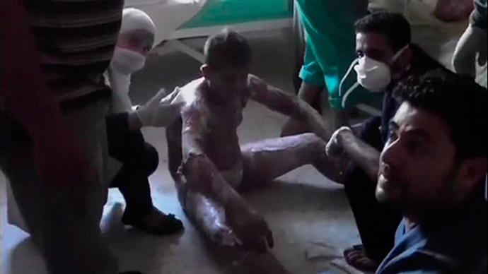 This still image taken from an amateur video off a social media website on August 30, 2013 purportedly shows a man (C) treated by medical staff after an attack that according to the video took place on August 26, 2013, at a hospital said to be in the western suburb of Uorm al-Kubra in Aleppo (Reuters)
