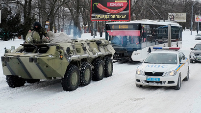 Ukraine scraps human rights treaty for rebel areas, cuts services, freezes banks