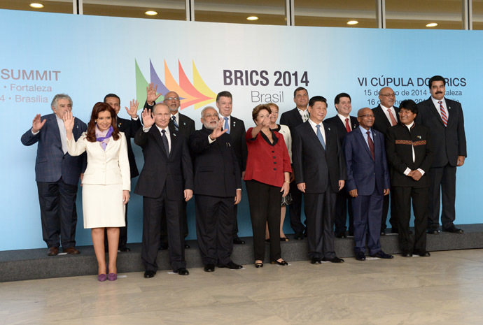 Foreground, from left: Argentine President Cristina Fernandez de Kirchner, Russian President Vladimir Putin, Indian Prime Minister Narendra Modi, Brazilian President Dilma Rousseff, and Chinese President Xi Jinping pose for a group photo at the meeting of BRICS leaders and the Union of South American Nations leaders, July 16, 2014. (RIA Novosti)