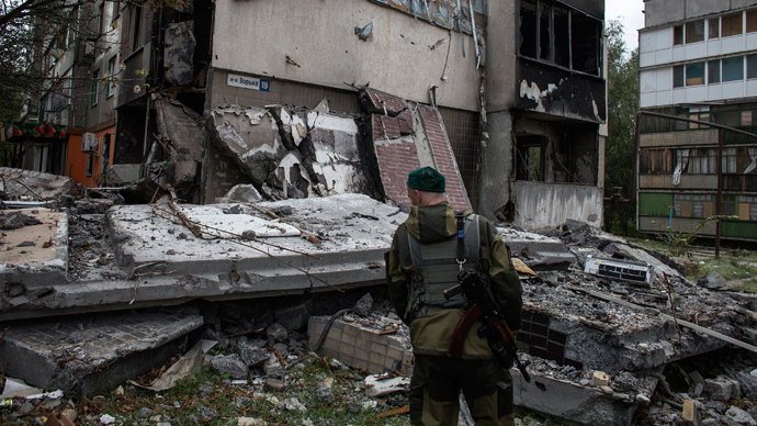 Ukraine scraps human rights treaty for rebel areas, cuts services, freezes banks