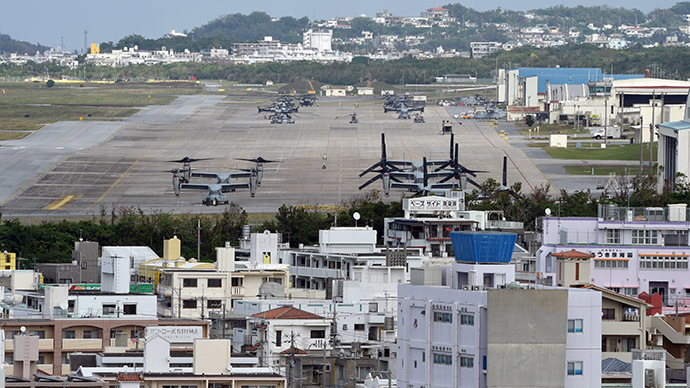 This photo taken on November 14, 2014 shows multi-mission tiltrotor Osprey aircraft at the US Marine's Camp Futenma in a crowded urban area of Ginowan, Okinawa prefecture, ahead of Okinawa's gubernatorial election. (AFP Photo/Toru Yamanaka)