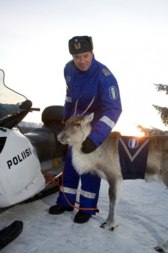 Finnish policeman and official police reindeer (photo from imgur.com/gallery/10QogDd )