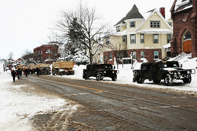 This US Army National Guard photo shows New York Army National Guard Soldiers from the 152nd Engineer Company as they use engineering equipment to assist in snow removal on November 20, 2014 efforts in Buffalo, New York. (AFP Photo/US Army National Guard/Senior Master Sgt. Ray Lloyd)
