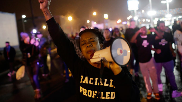 Arming for Ferguson post-verdict turmoil, woman fatally shoots self