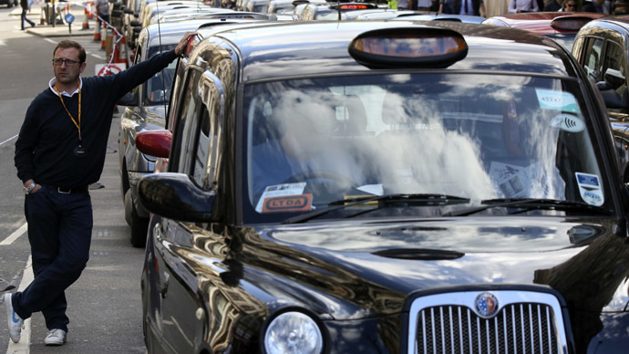 London cab drivers enlist private detectives in Uber taxi wars