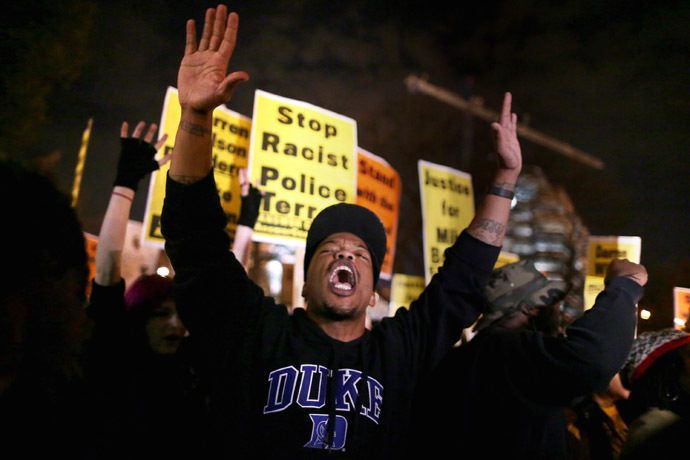 Hundreds of demonstrators gather to protest the day after the Ferguson grand jury decision to not indict officer Darren Wilson in the Michael Brown case November 25, 2014 in Washington, DC. (Chip Somodevilla/Getty Images/AFP)