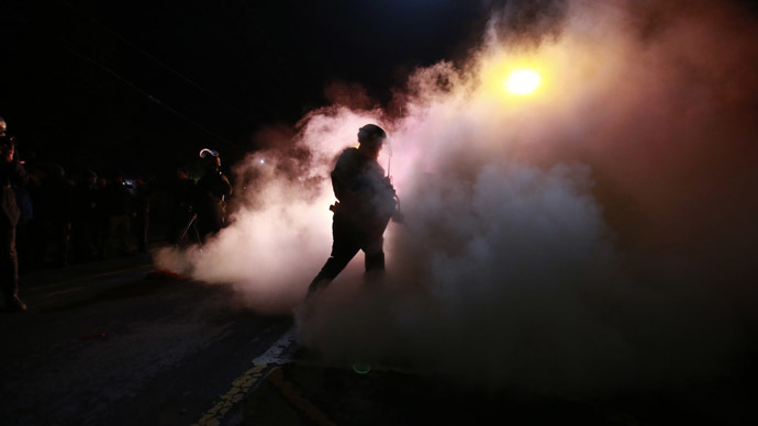 ‘Calmer night’ in Ferguson: 44 arrests, tear gas, Molotov cocktails, cop car torched