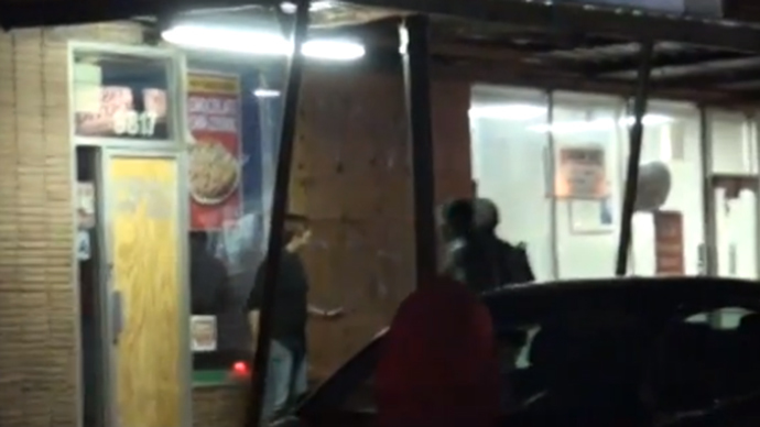 Ferguson brave: Female manager defends her business from looters (VIDEO)