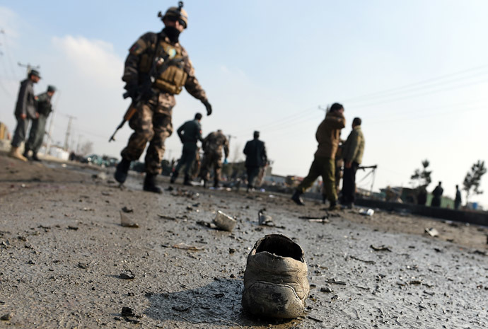 A shoe belonging to a man killed in a suicide attack is pictured at the scene along the Kabul-Jalalabad road in Kabul on November 27, 2014. (AFP Photo/Shah Marai)