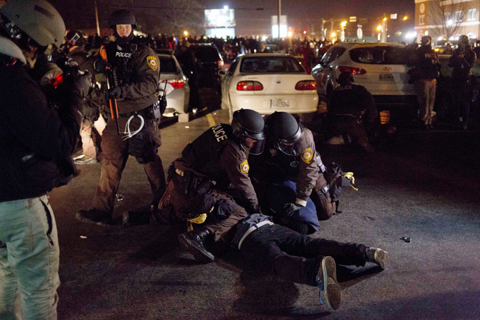 Police make an arrest as protests engulf Ferguson on November 26, 2014 in Ferguson, Missouri. (Aaron P. Bernstein/Getty Images/AFP)